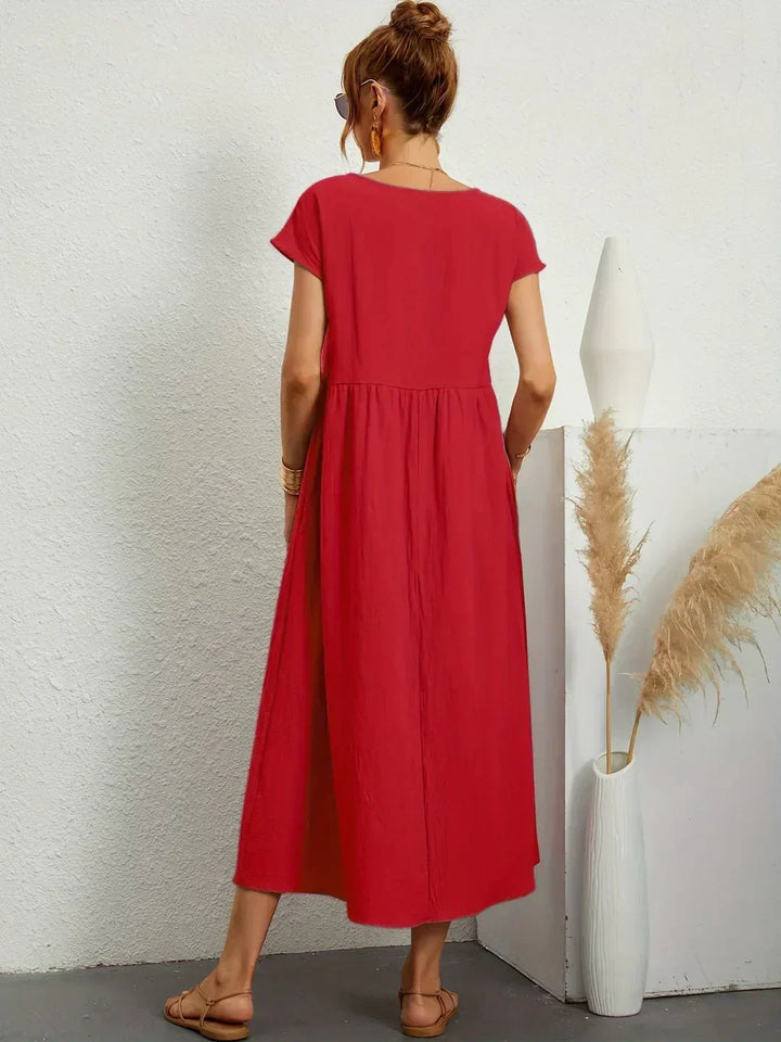 Margaret™ — A flowing midi dress with timeless elegance