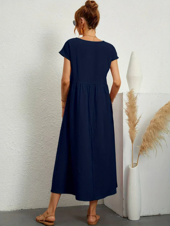 Margaret™ — A flowing midi dress with timeless elegance