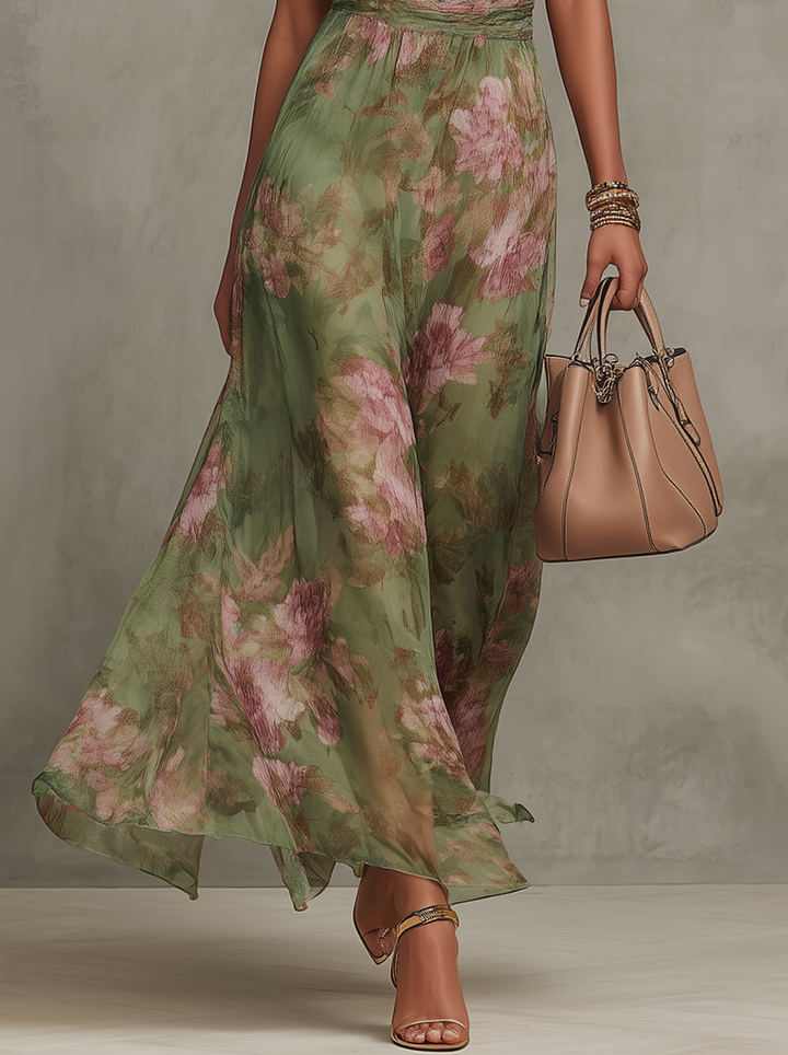 Serena™ | Long green dress with a floral print and a halter neck